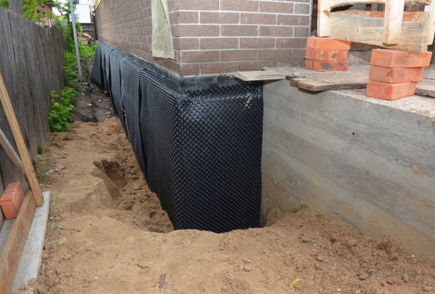 Happy homeowners after waterproofing job in Grovertown